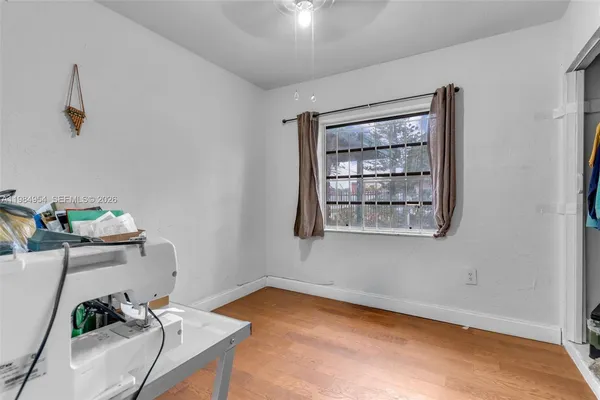 a view of livingroom with furniture and toys
