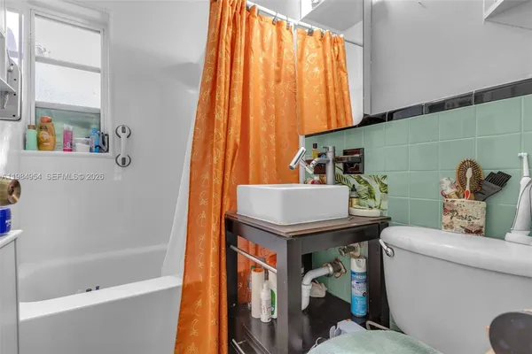 a bathroom with a sink and a bathtub