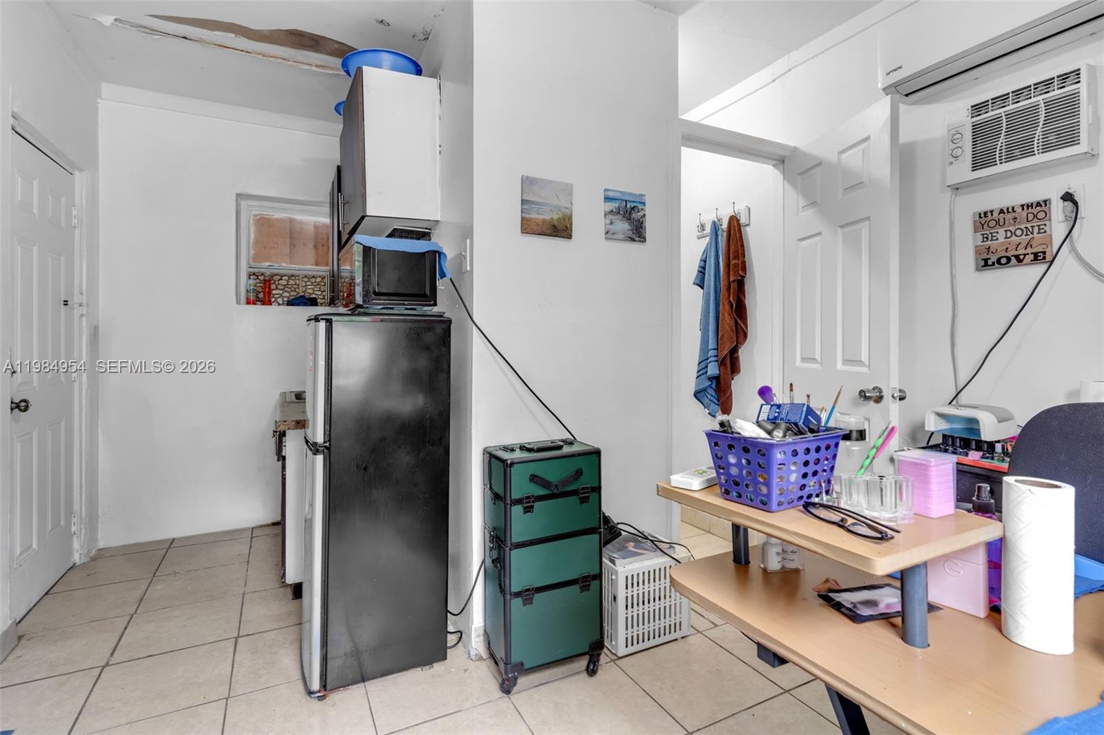 2490 Northwest 59th Street Miami, FL 33142 - Photo 25 of 37 a living room with furniture