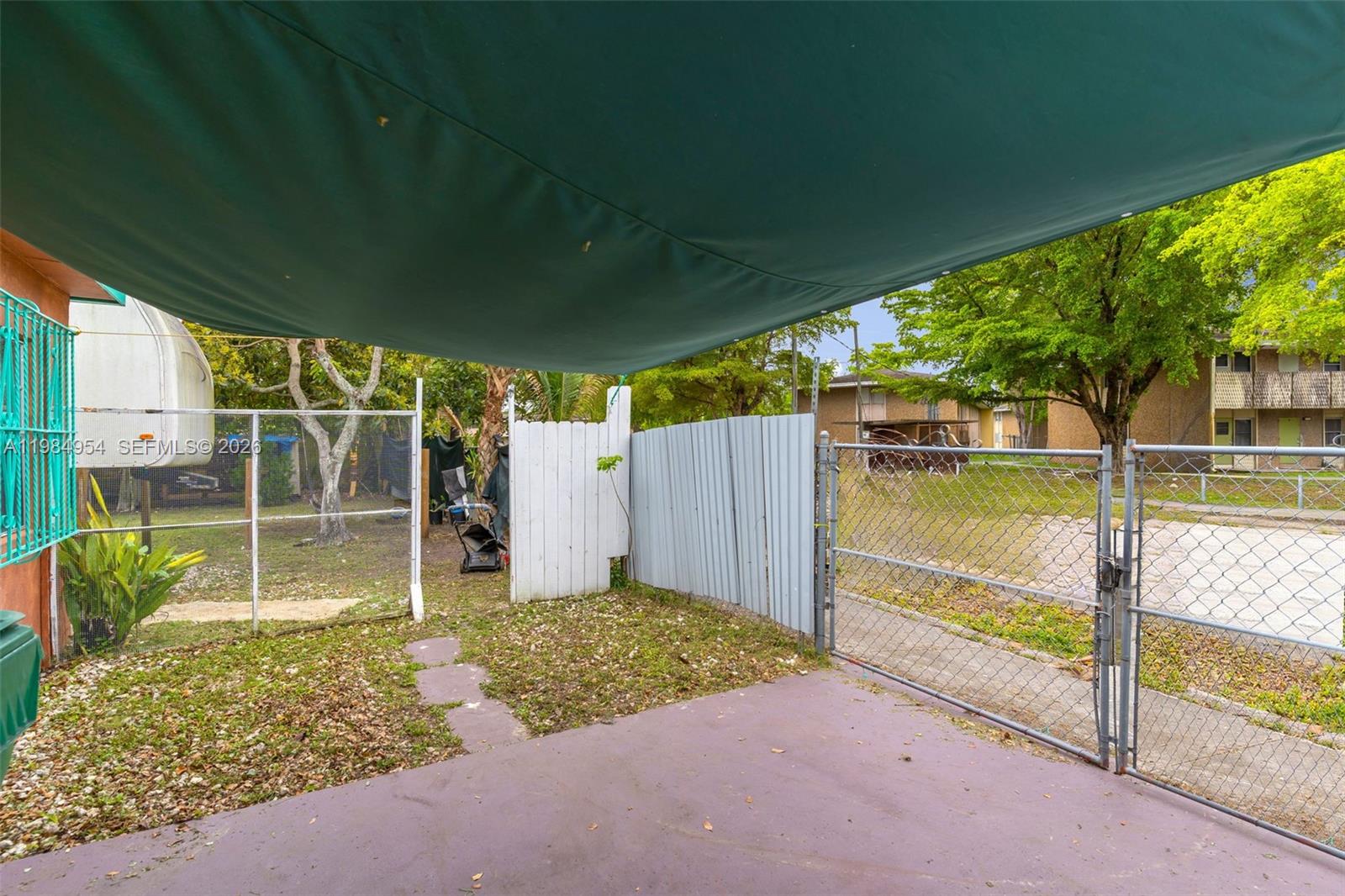 2490 Northwest 59th Street Miami, FL 33142 - Photo 31 of 37 a view of a backyard