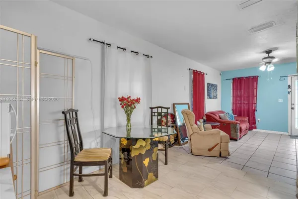 a living room with furniture and a couch