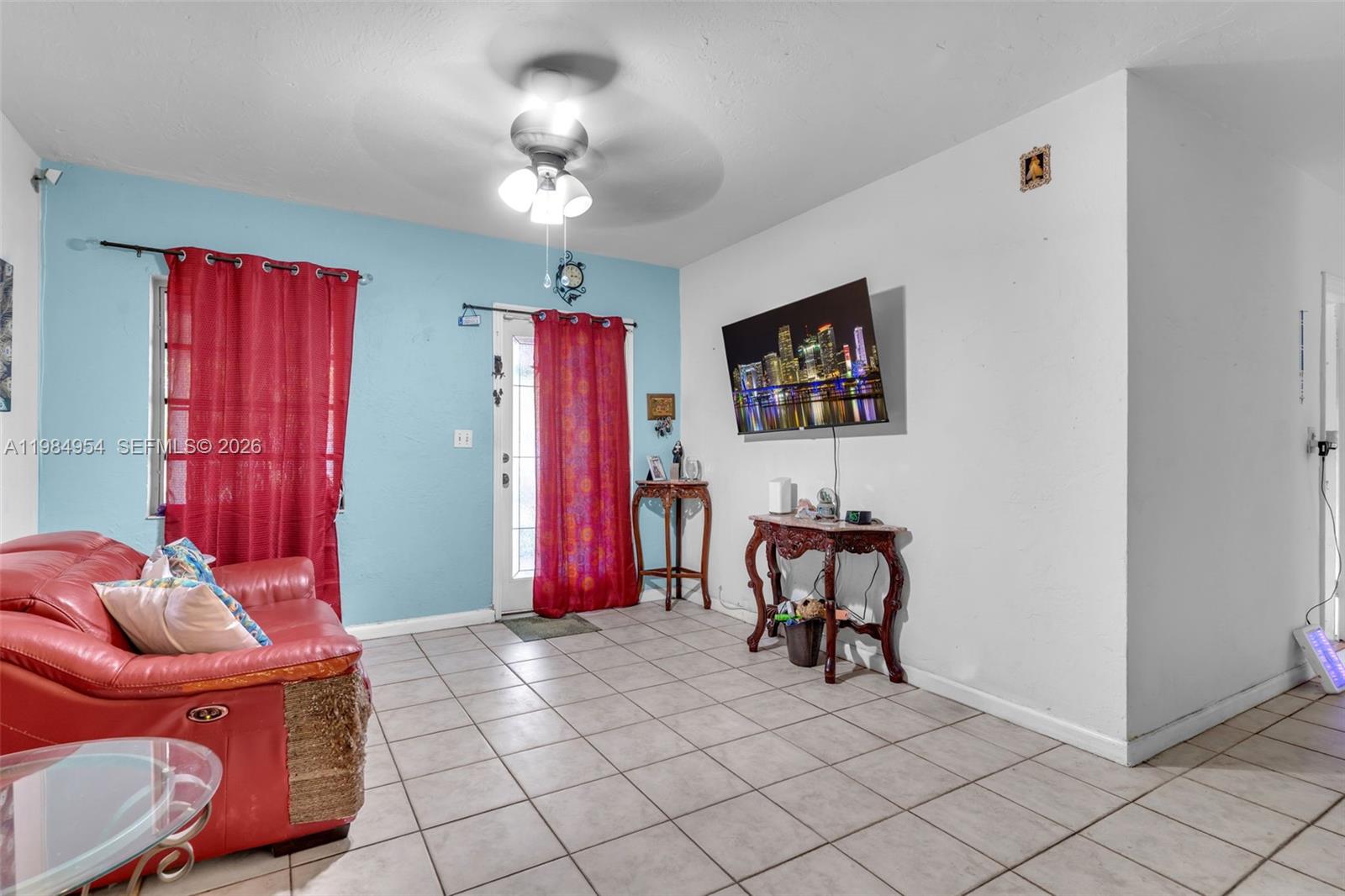 2490 Northwest 59th Street Miami, FL 33142 - Photo 10 of 37 a living room with furniture