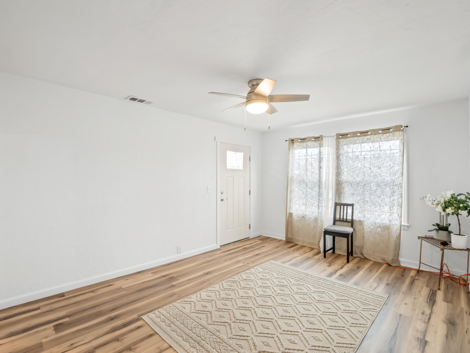 1315 North 8th Street Fresno, CA 93703 - Photo 6 of 28 Brand New Ceilings Fans installed throughout the Home