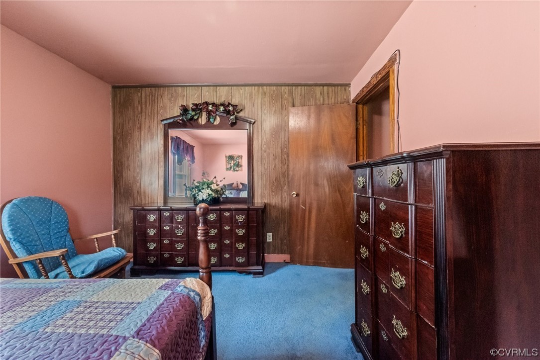 1878 Courthouse Road Louisa, VA 23093 - Photo 15 of 30 a bed room with a bed and a chair