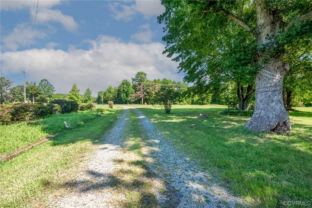 1878 Courthouse Road Louisa, VA 23093 - Photo 2 of 30 a view of a garden with a fountain