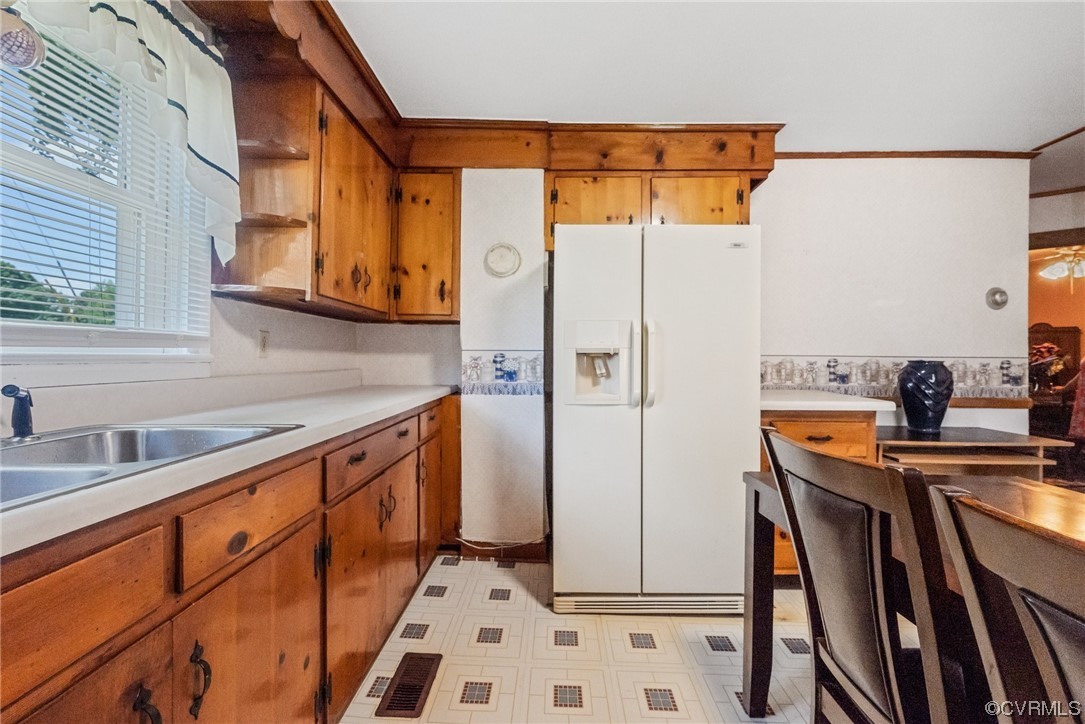 1878 Courthouse Road Louisa, VA 23093 - Photo 21 of 30 a kitchen with stainless steel appliances a stove a sink and a refrigerator