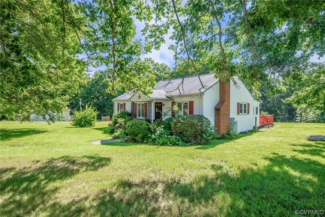 1878 Courthouse Road Louisa, VA 23093 - Photo 5 of 30 a front view of a house with yard and green space