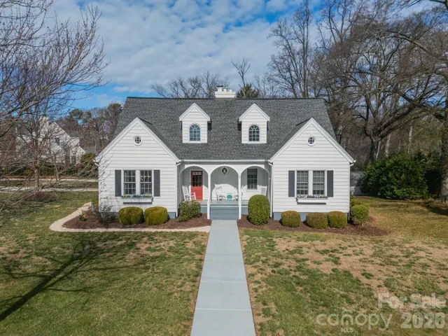 a aerial view of a house with outdoor space