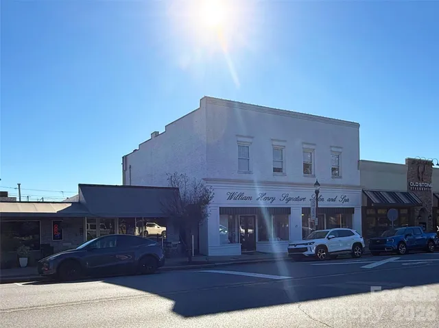 a view of a building with a street