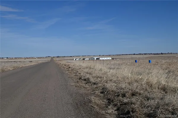 a view of a road with an outdoor space