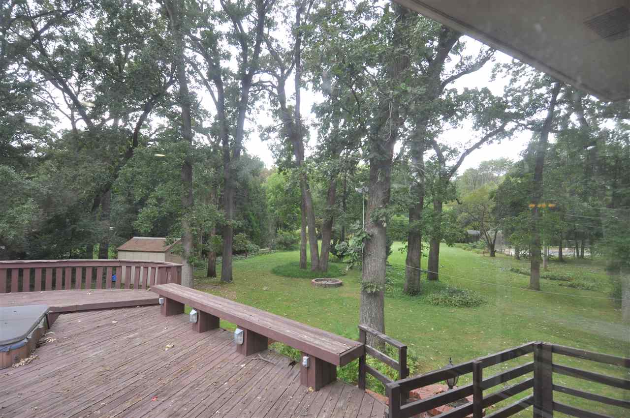 3318 Brookview Road Rockford, IL 61107 - Photo 28 of 30 a view of a park with large trees