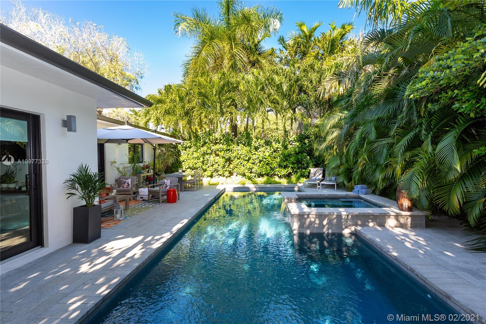 5185 Alton Road Miami Beach, FL 33140 - Photo 31 of 41 a view of yard with patio