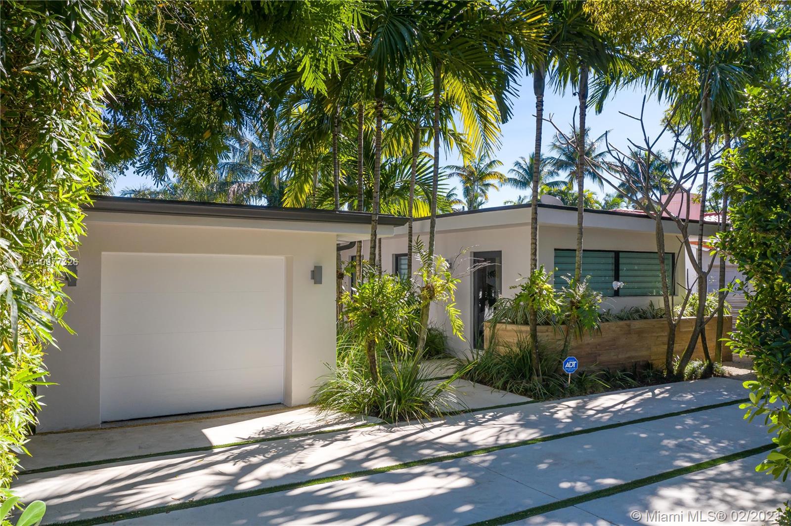 5185 Alton Road Miami Beach, FL 33140 - Photo 35 of 41 a view of a house with small garden