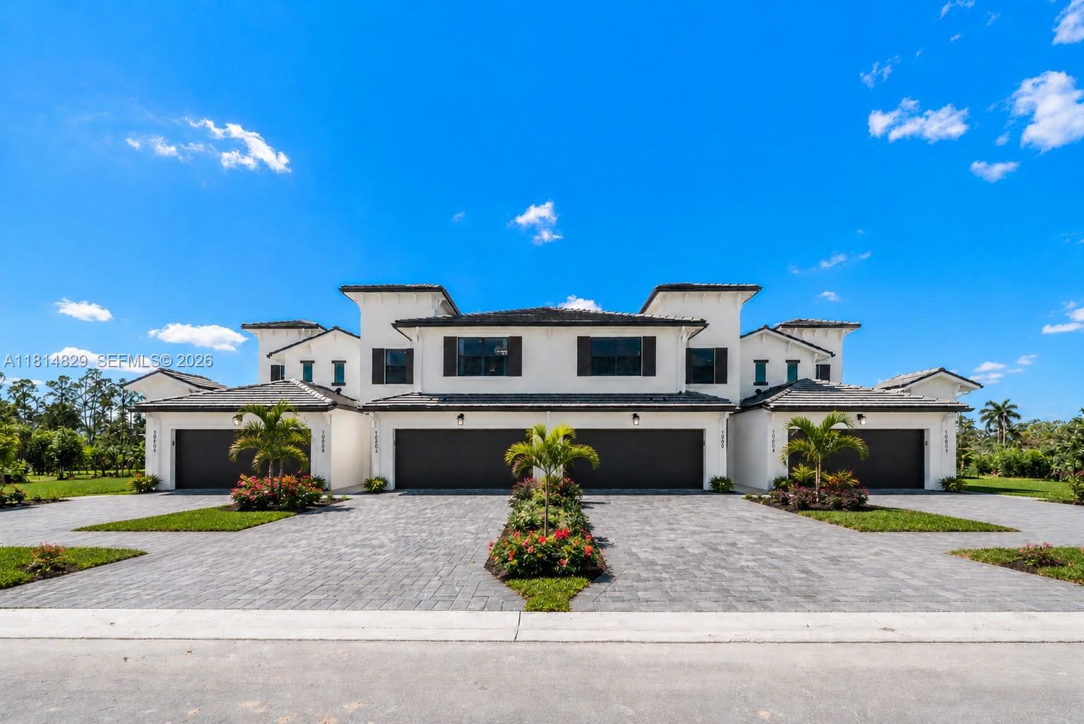 6085 Barbara Circle Naples, FL 34112 - Photo 9 of 21 a front view of a house with a garage
