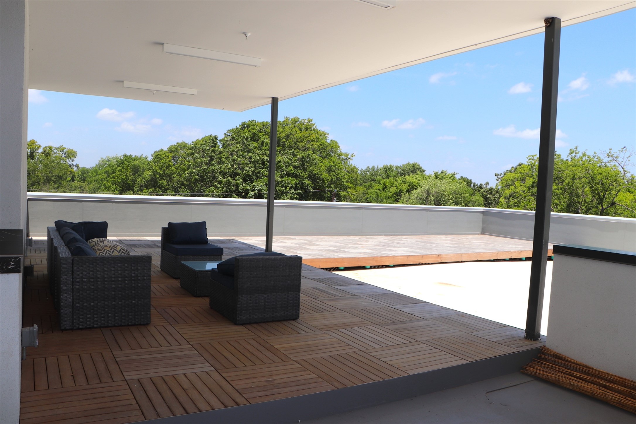 5515 Humming Bird Lane, Unit 306 Austin, TX 78745 - Photo 28 of 29 3rd Floor Terrace offers tranquil views of downtown and an airy lounge area