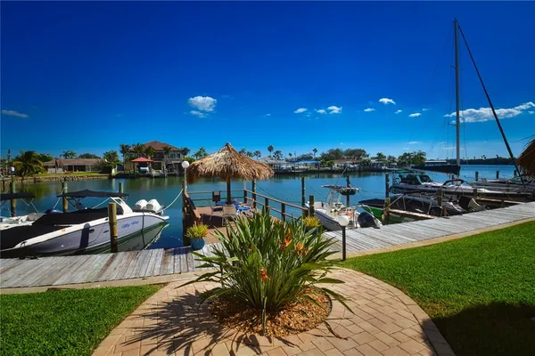 a view of a backyard with sitting area