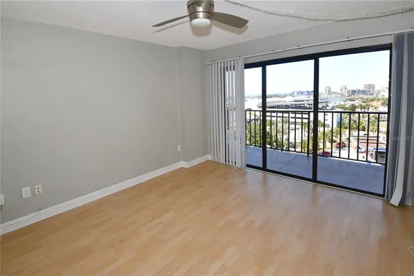 a view of an empty room with a window