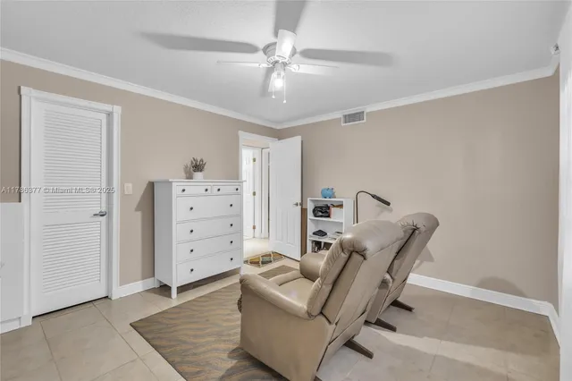 a living room with furniture and decor