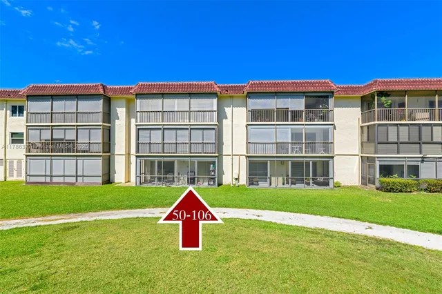 a view of a house with a swimming pool