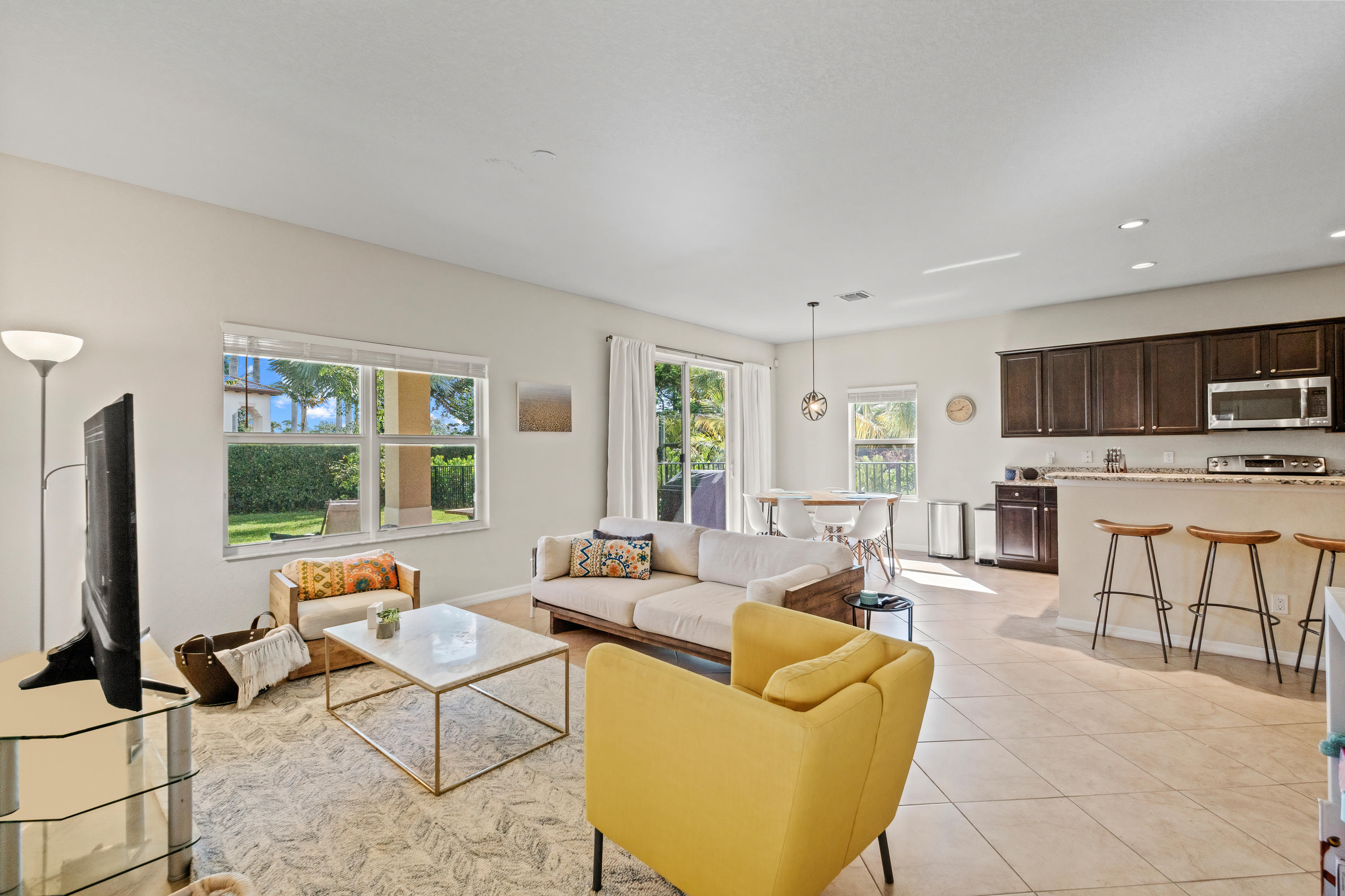 135 Rudder Cay Way Jupiter, FL 33458 - Photo 6 of 25 Family Room to Kitchen