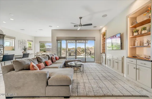 a spacious bathroom with a double vanity sink and a large window