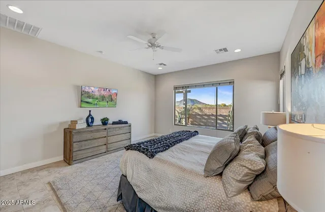 a spacious bathroom with a granite countertop sink mirror and shower