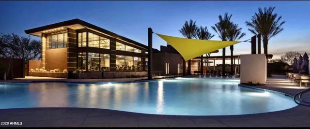 a view of a patio with swimming pool