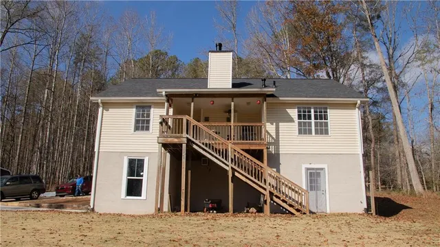 a view of a house with a snow on the side of the house