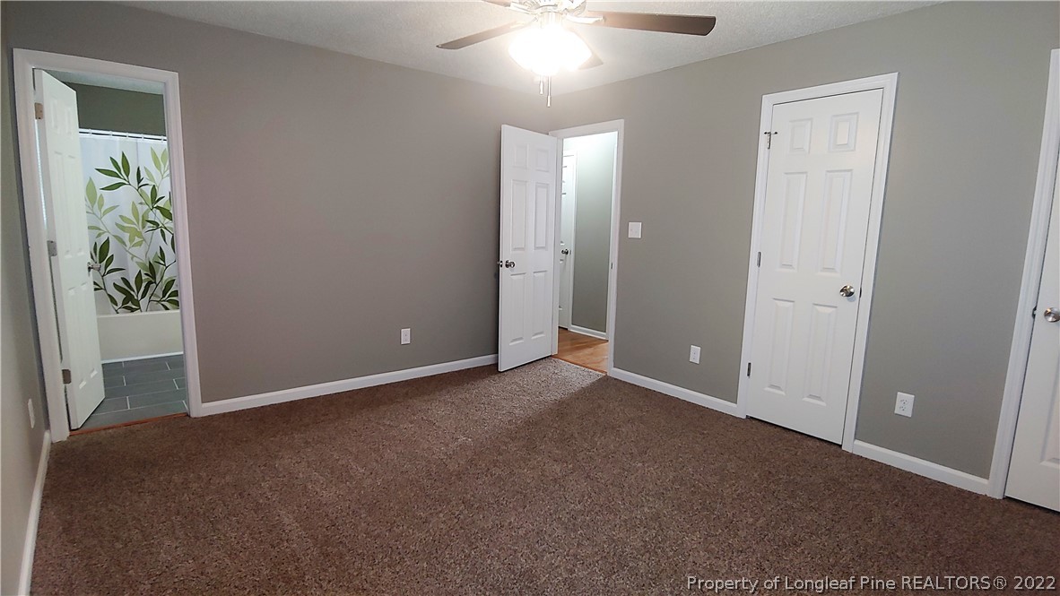 481 Camden Road Raeford, NC 28376 - Photo 15 of 18 an empty room with windows and closet