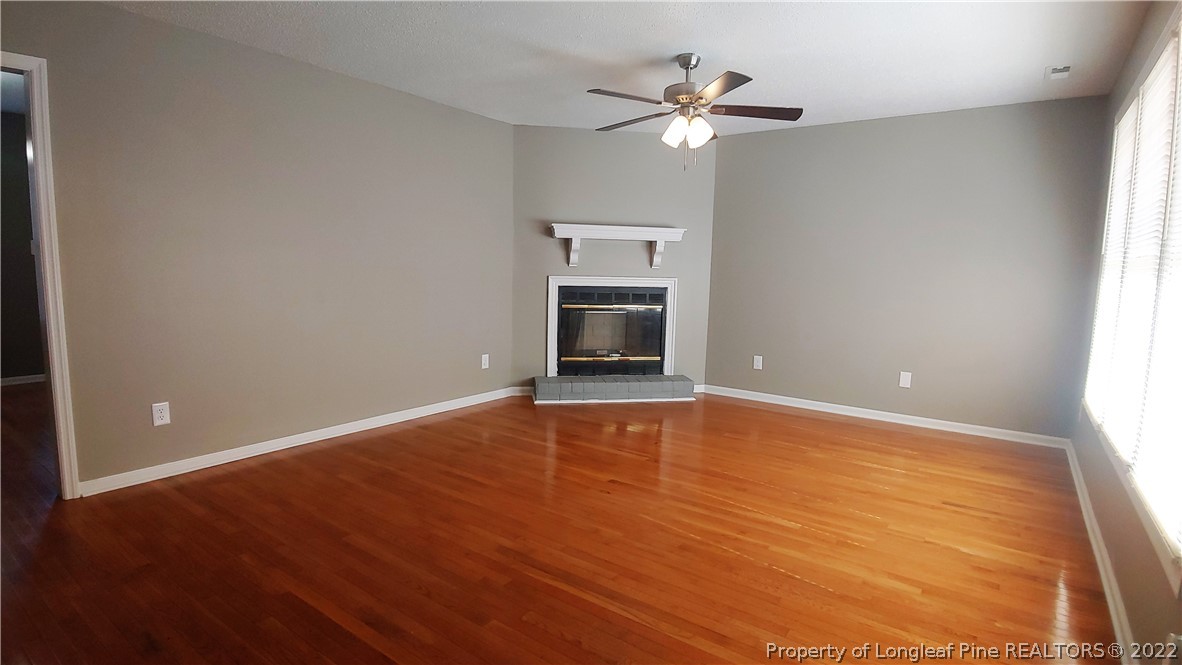 481 Camden Road Raeford, NC 28376 - Photo 4 of 18 an empty room with fan and windows