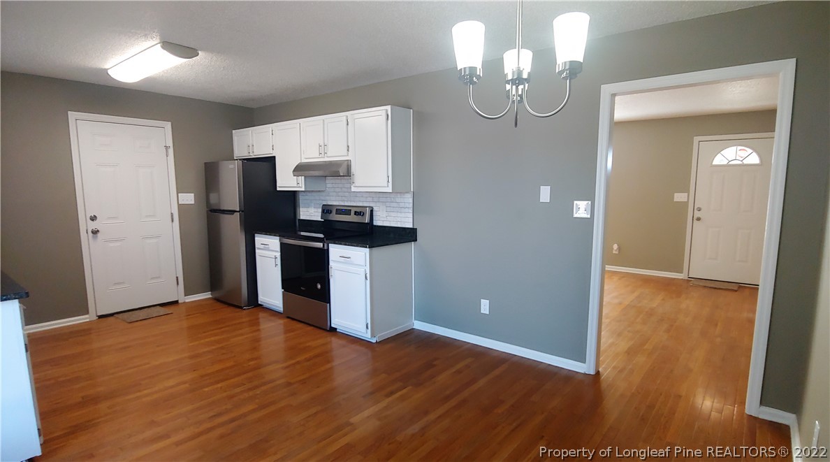 481 Camden Road Raeford, NC 28376 - Photo 5 of 18 a view of a kitchen cabinets and wooden floor