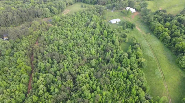 a view of a golf course with a lake