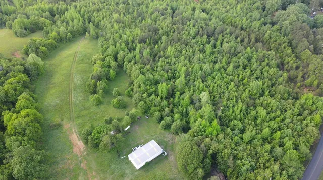 a view of a golf course with green space