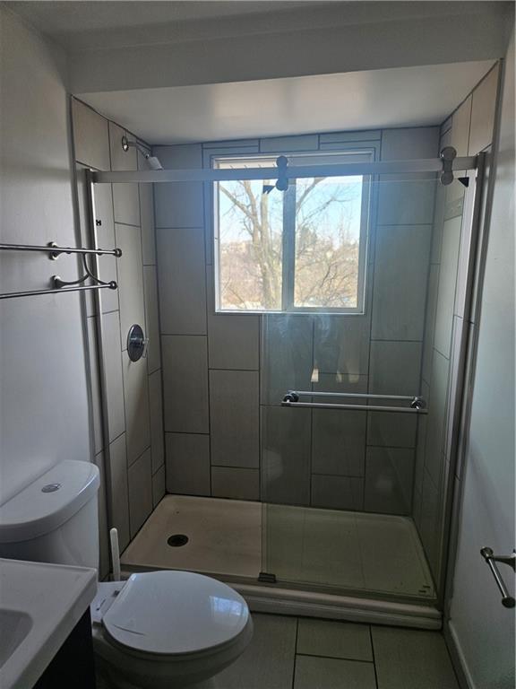 812 Westbury Road, Unit A North Versailles, PA 15137 - Photo 17 of 40 a bathroom with a toilet and a shower
