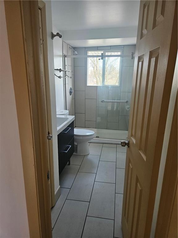 812 Westbury Road, Unit A North Versailles, PA 15137 - Photo 21 of 40 a bathroom with a shower and a toilet