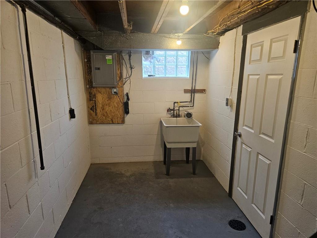 812 Westbury Road, Unit A North Versailles, PA 15137 - Photo 33 of 40 a view of a hallway with wooden floor and windows