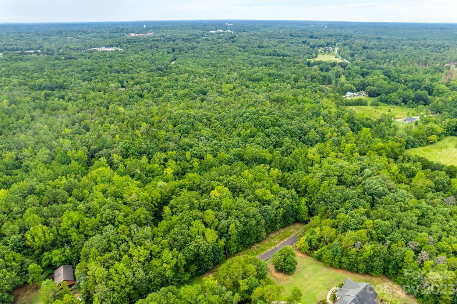 Tbd Wilderness Lane, Unit 18 Lancaster, SC 29720 - Photo 7 of 14 a view of a large yard with lots of green space