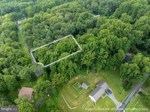 an aerial view of a golf course with street view