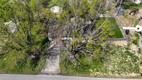 $299,000 | 1604 Ridgeway Drive, Greenwood, MO 64034