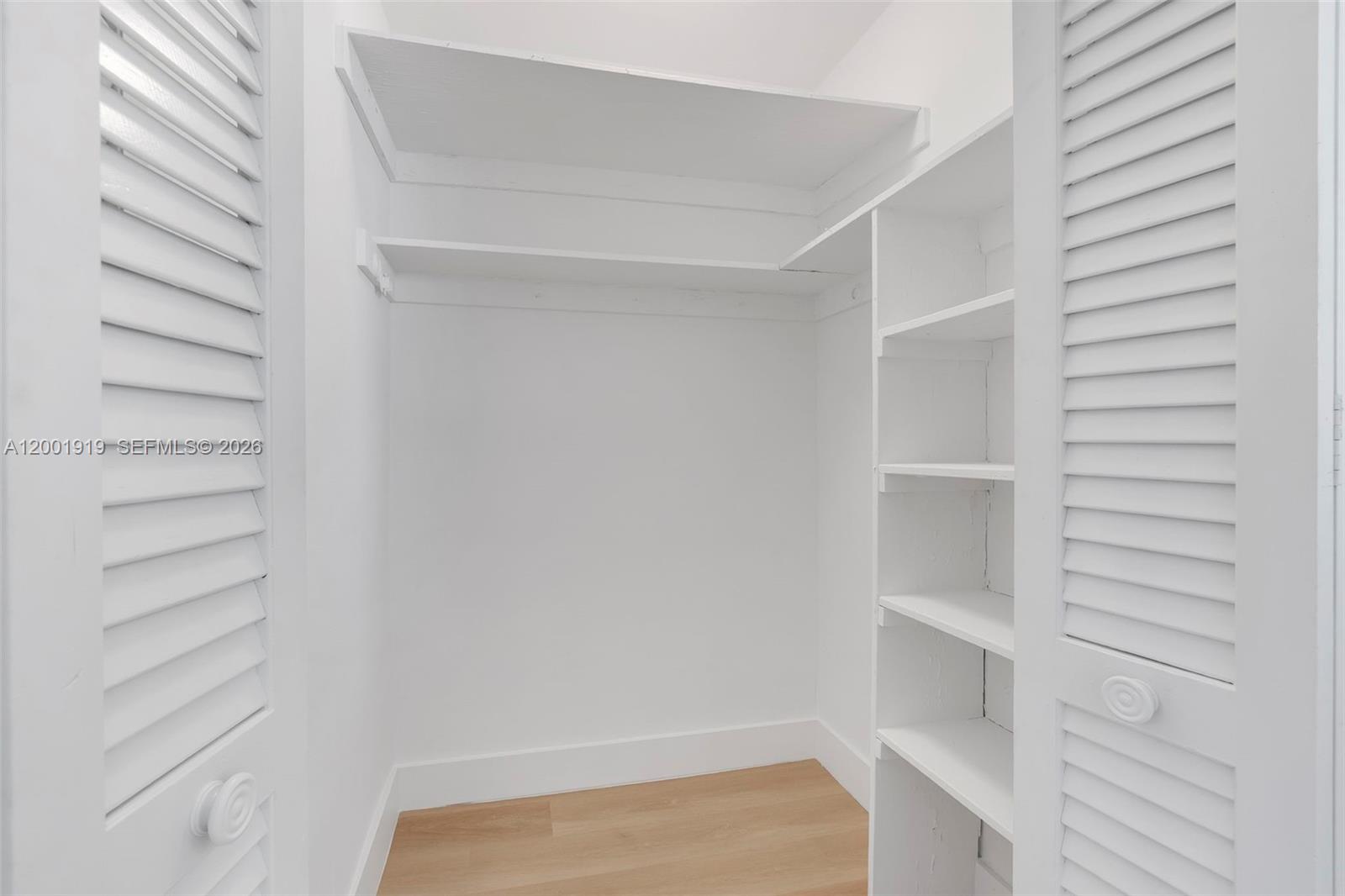 7970 Northwest 176th Street Hialeah, FL 33015 - Photo 24 of 32 a view of walk in closet