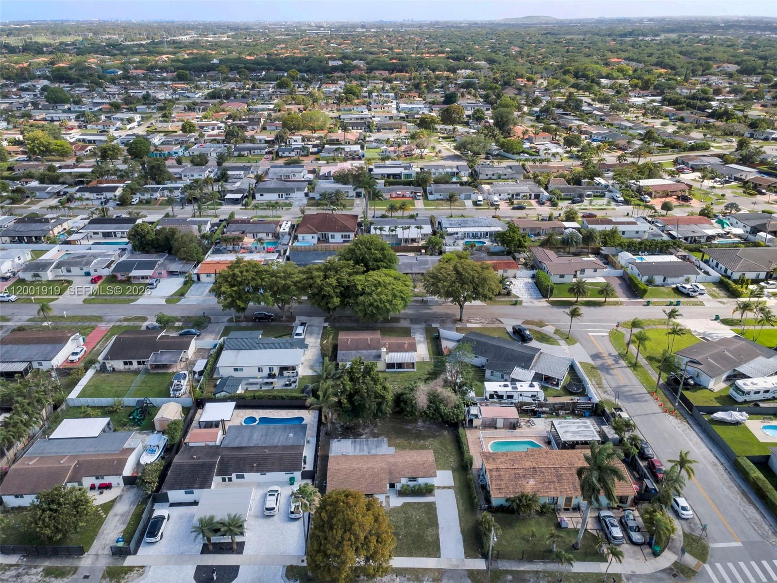 7970 Northwest 176th Street Hialeah, FL 33015 - Photo 31 of 32 an aerial view of a city