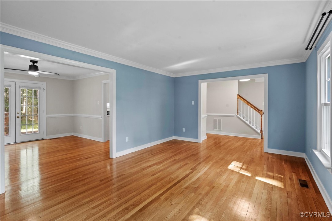 2430 Olde Stone Road Midlothian, VA 23113 - Photo 11 of 46 a view of empty room with wooden floor and fan