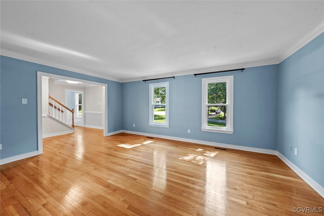 2430 Olde Stone Road Midlothian, VA 23113 - Photo 12 of 46 a view of empty room with wooden floor and fan