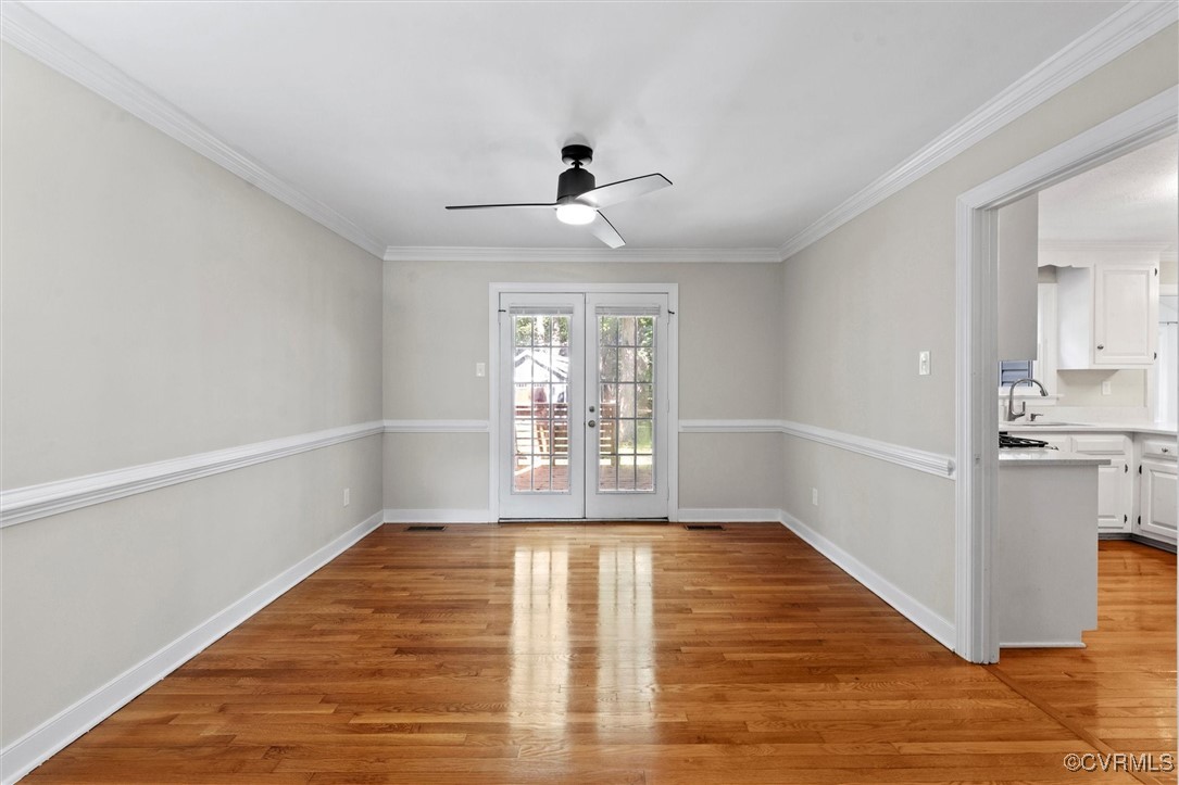 2430 Olde Stone Road Midlothian, VA 23113 - Photo 14 of 46 a view of empty room with wooden floor and fan