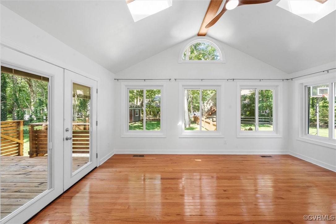 2430 Olde Stone Road Midlothian, VA 23113 - Photo 19 of 46 a view of an empty room with wooden floor and a window