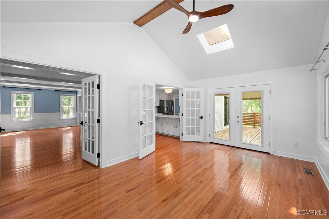 2430 Olde Stone Road Midlothian, VA 23113 - Photo 21 of 46 an empty room with wooden floor and windows