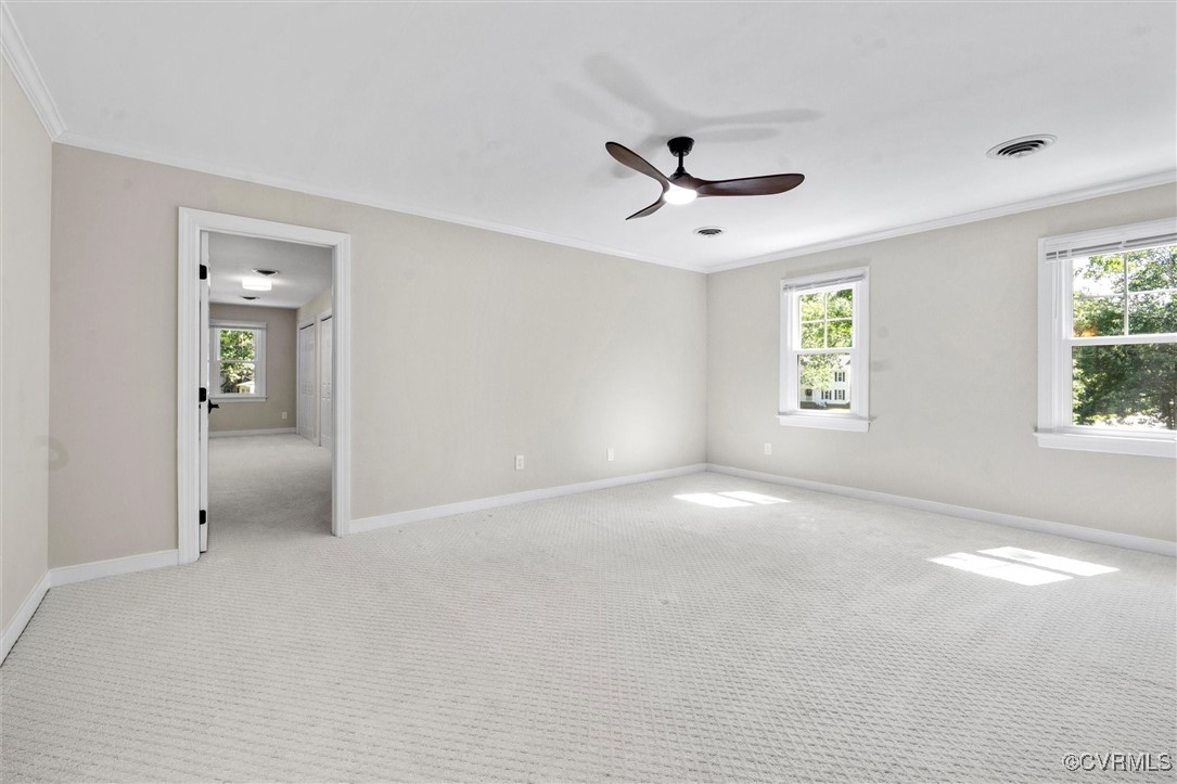 2430 Olde Stone Road Midlothian, VA 23113 - Photo 25 of 46 a view of a big room with windows and chandelier fan