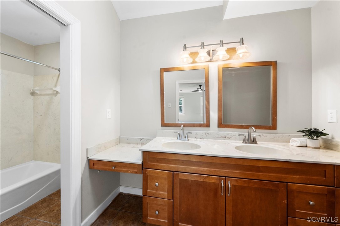 2430 Olde Stone Road Midlothian, VA 23113 - Photo 27 of 46 a bathroom with a sink and a mirror
