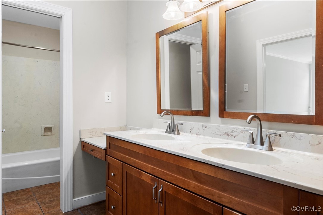 2430 Olde Stone Road Midlothian, VA 23113 - Photo 28 of 46 a bathroom with a sink and a mirror