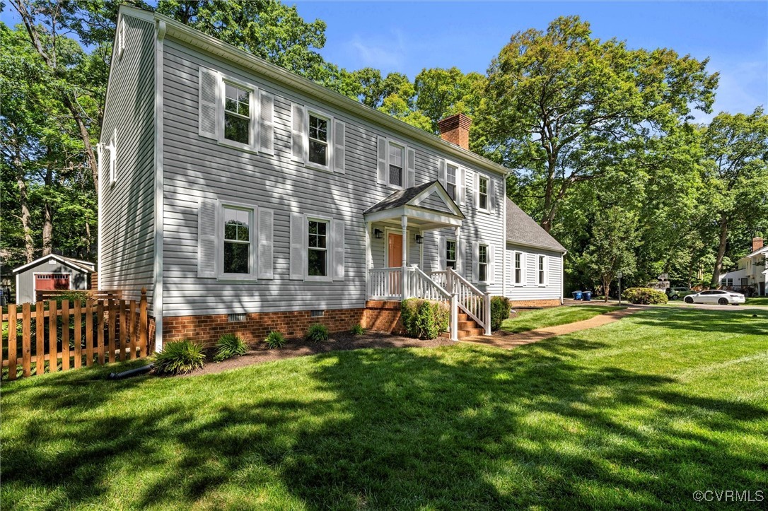 2430 Olde Stone Road Midlothian, VA 23113 - Photo 3 of 46 a front view of a house with a yard